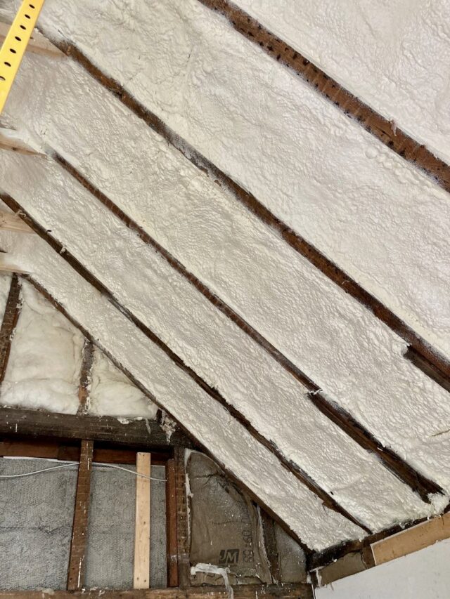 Sloped roof insulated with spray foam insulation.