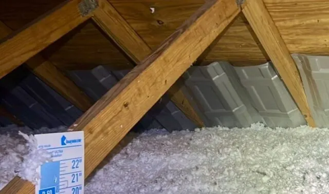attic with blown-in insulation
