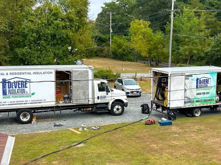 DeVere HP work trucks parked outside of customer's house.